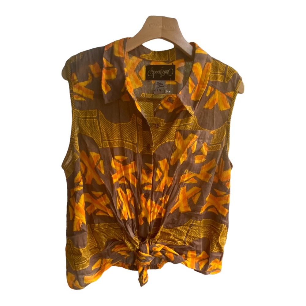 - - NWT Sleeveless Tropical vibe  Rayon Tie Front Top. Elastic at back on …
